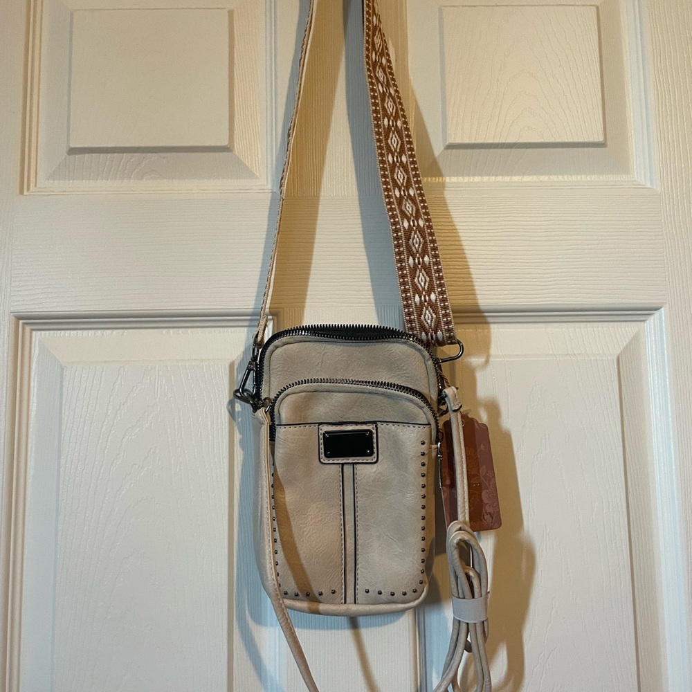 Elegant Cream Crossbody Bag with Patterned Strap
